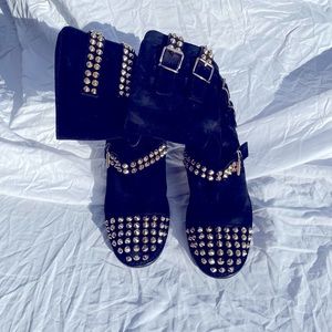 Authentic Giuseppe Zanotti suede high-top boots.